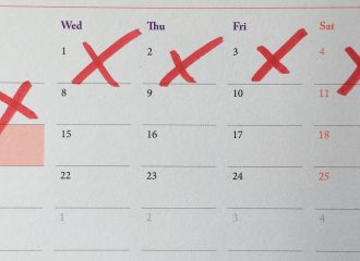 Calendar with days crossed off in red