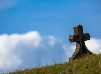 Cross in field to represent Life Cover
