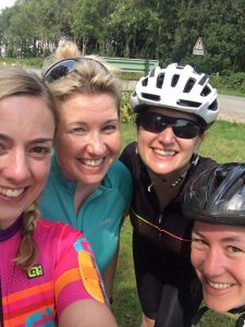 4 happy female cyclists 