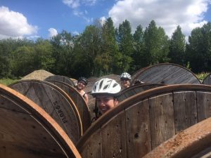 Large wooden reels of cable used as a outdoor toilet