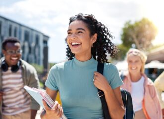 Laughing student with friends
